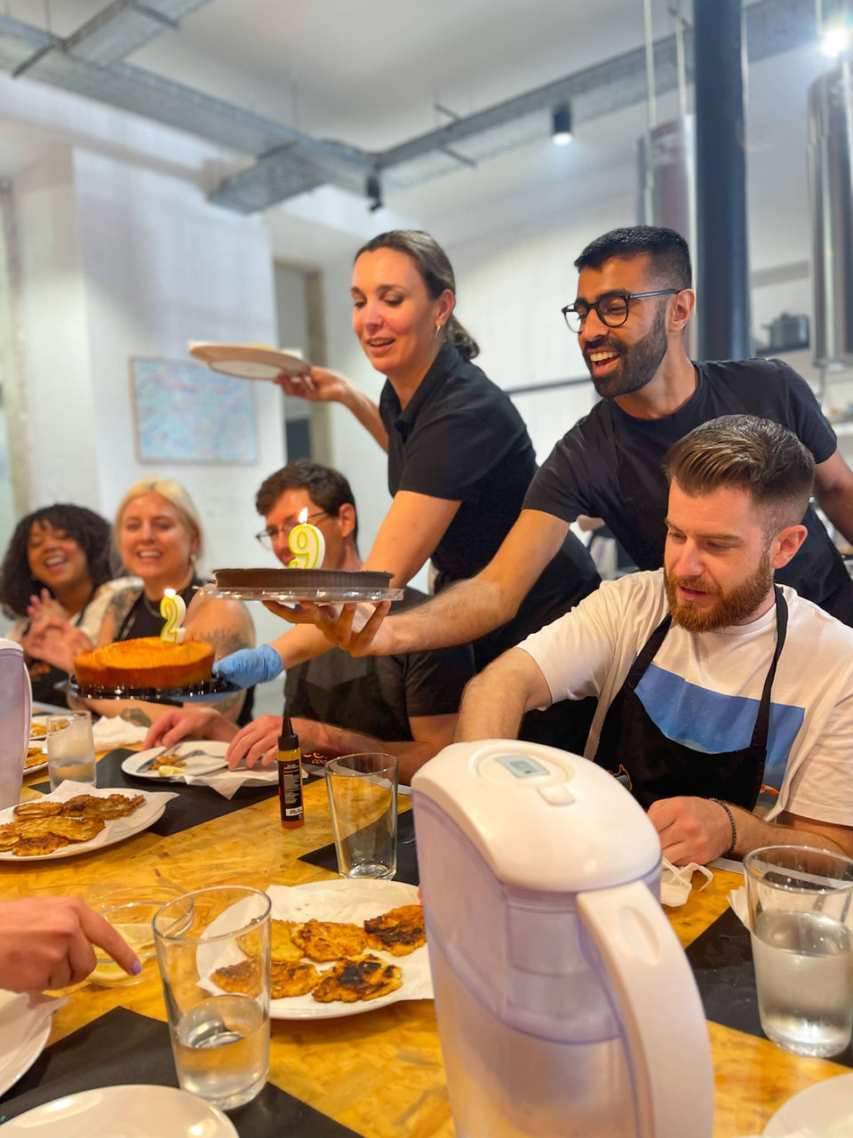 FTLO travelers being served dinner on a trip to Portugal