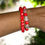 Thumbnail: Solid Red Beaded Bracelet with Matching Red and Clear Oval Bead Bracelet