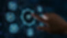 Touchscreen with central "IT" icon surrounded by seven additional icons representing security, development, personnel, and other mission support areas.