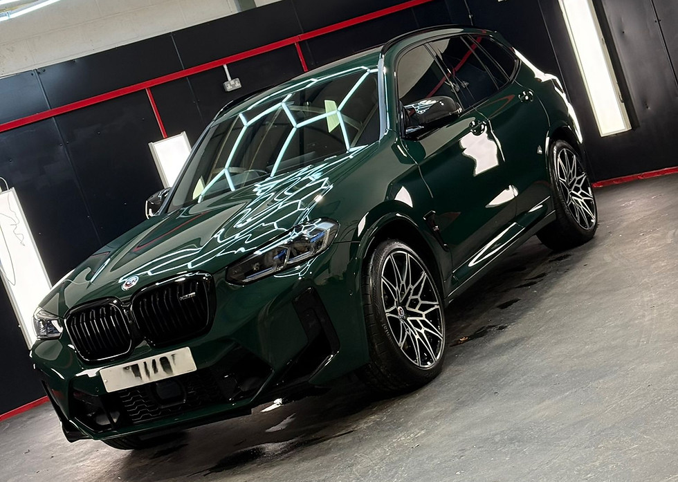 Dark green luxury car detailed inside studio. Mobile Car Detailing Manchester.