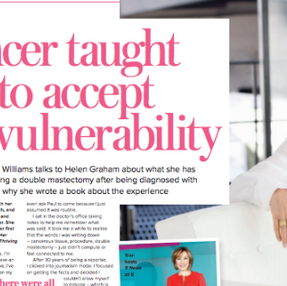 Sian Williams in white blouse sits on a sofa, text reads "Cancer taught me to accept my vulnerability." Bright pink text, modern setting, serious mood.