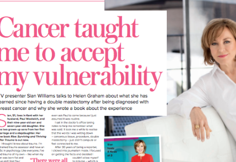 Sian Williams in white blouse sits on a sofa, text reads "Cancer taught me to accept my vulnerability." Bright pink text, modern setting, serious mood.