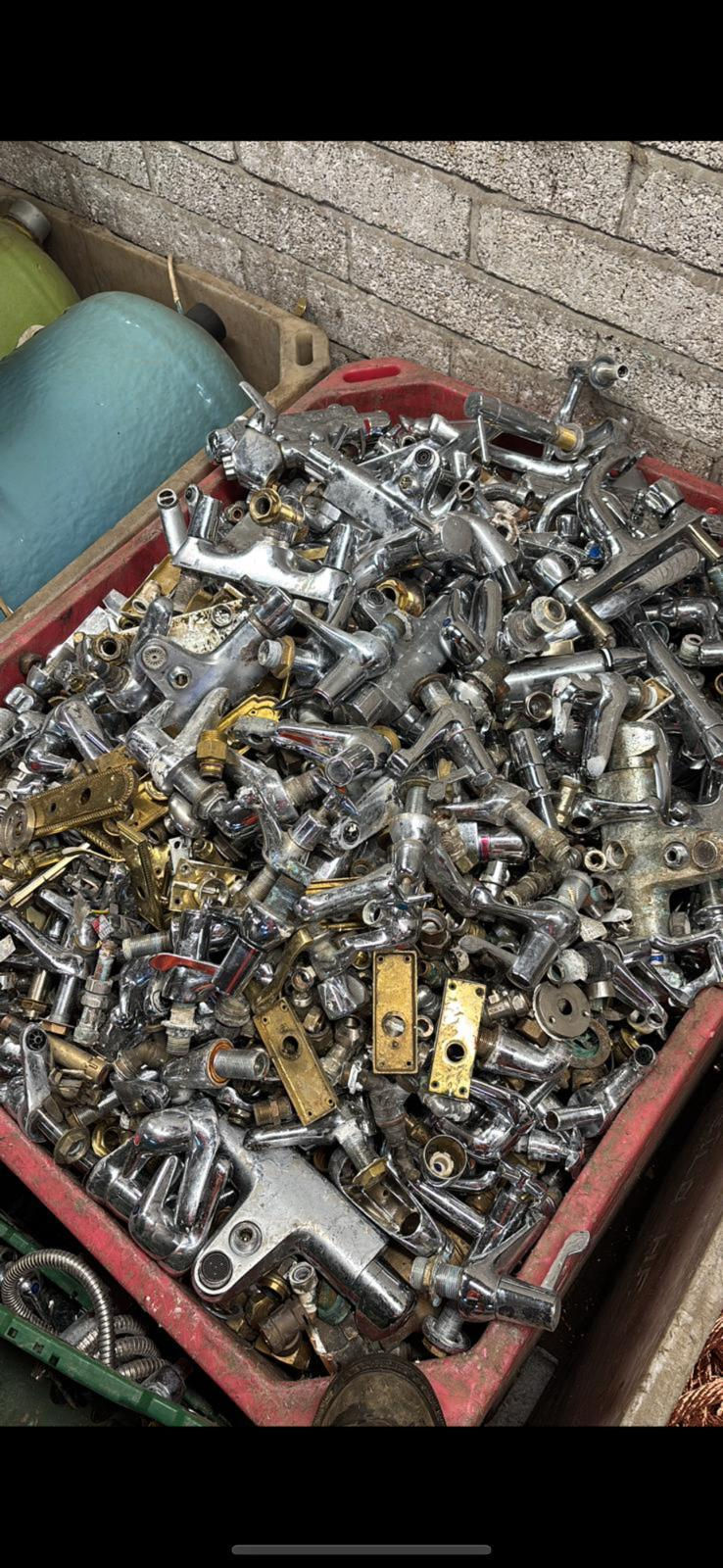 Assorted metal parts in a bin