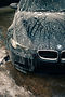 Water beading on a BMW hood after coating and correction