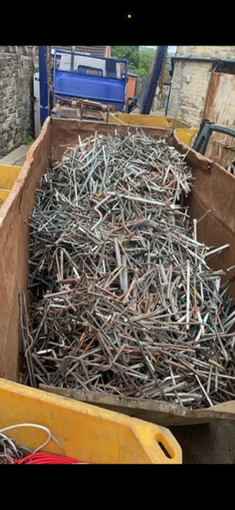Scrap metal pile in a container