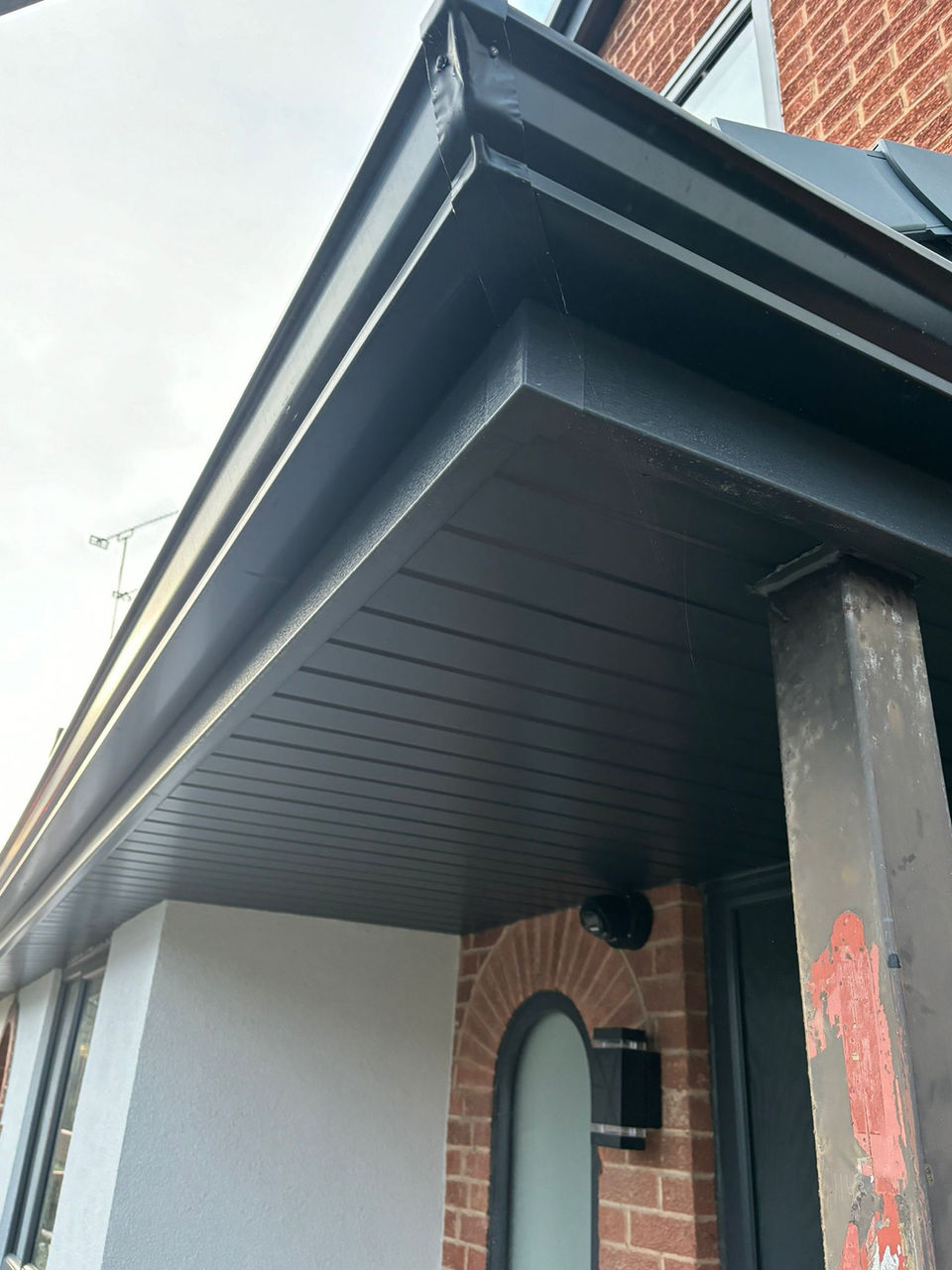 Dark gray seamless gutters and fascia