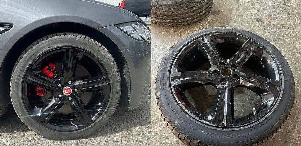 Car wheel with red calipers; detached black alloy wheel