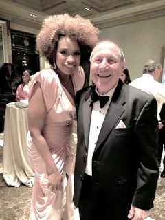 Leon Ziligson taking photo with Jennifer Hudson 