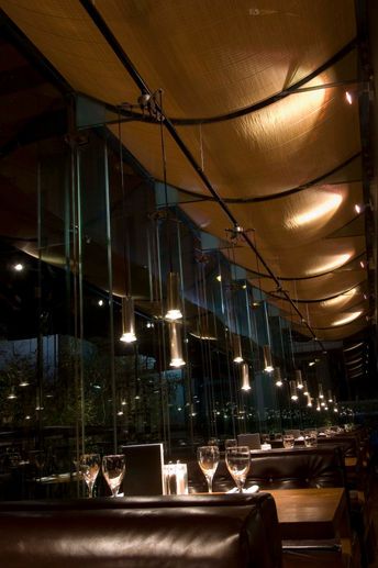 Hospitality interior design project for a steak house restaurant by experienced restaurant designers, showcasing premium restaurant design services and interiors.