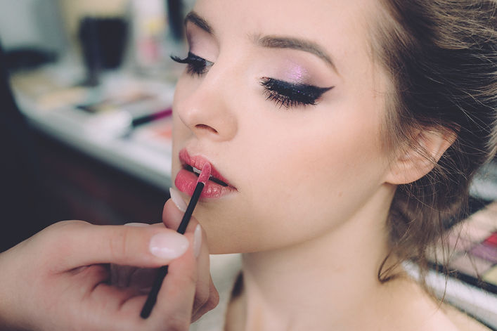 Girl getting makeup