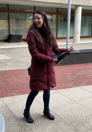 Woman popping champagne