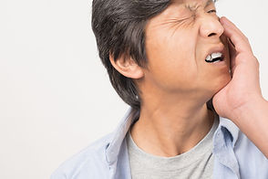 歯痛の男性