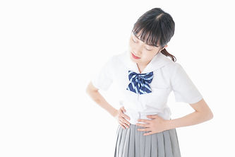 生理痛に悩む女子高生