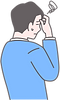 頭を悩ませている男性