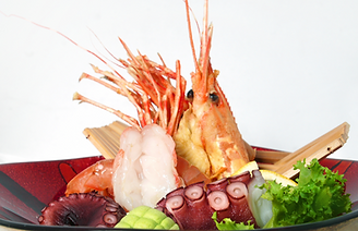 Fresh seafood sashimi platter with prawns and octopus.