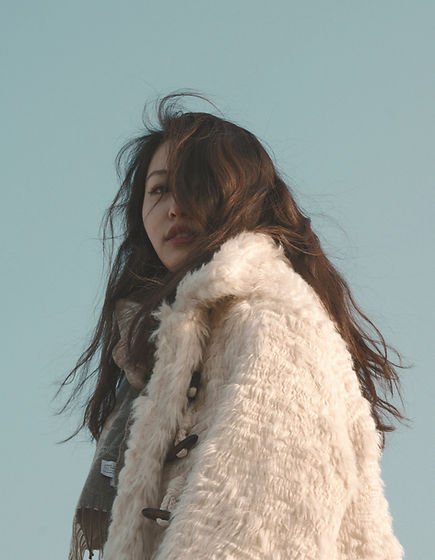 woman in white fur coat_edited_edited.jpg
