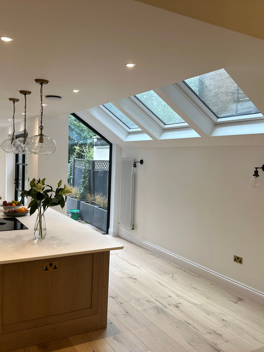 right kitchen extension in West Hampstead with skylights and garden access.