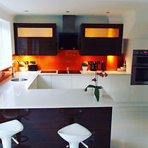 TPM Property Services - We transformed this home and gave it a modern open plan feel, by removing a dividing wall and installing this new kitchen