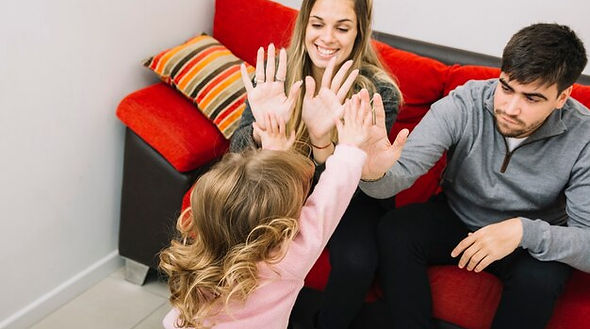 parents-giving-high-five-their-daughter_23-2147878449.jpg