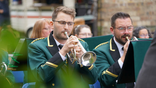The band playing at Barry Mill, one of the oldest working water-powered mills in Scotland
