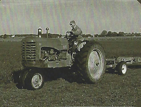 Great Grandpa and his tractor