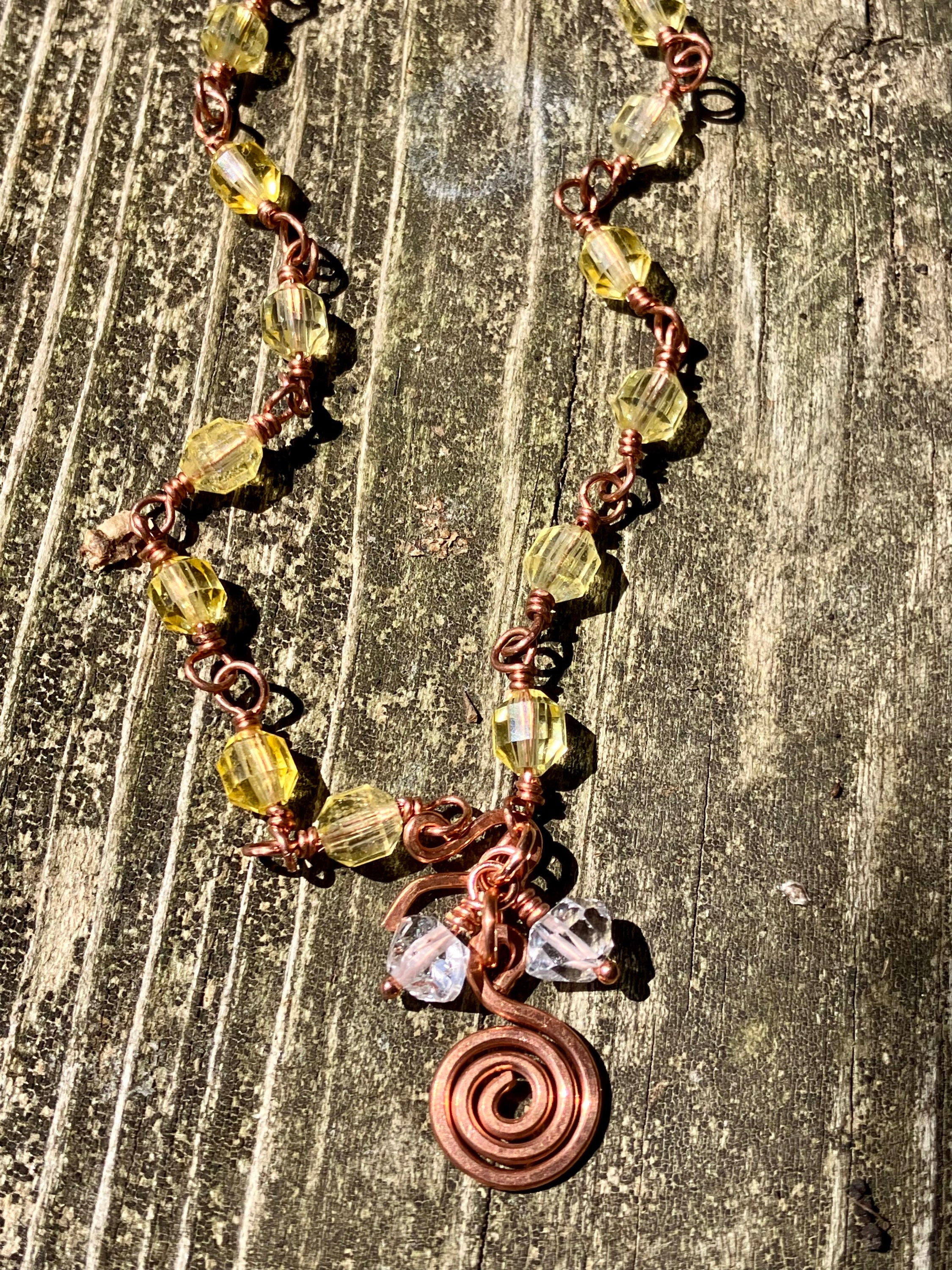 Faceted citrine on solid copper wire wrapped links