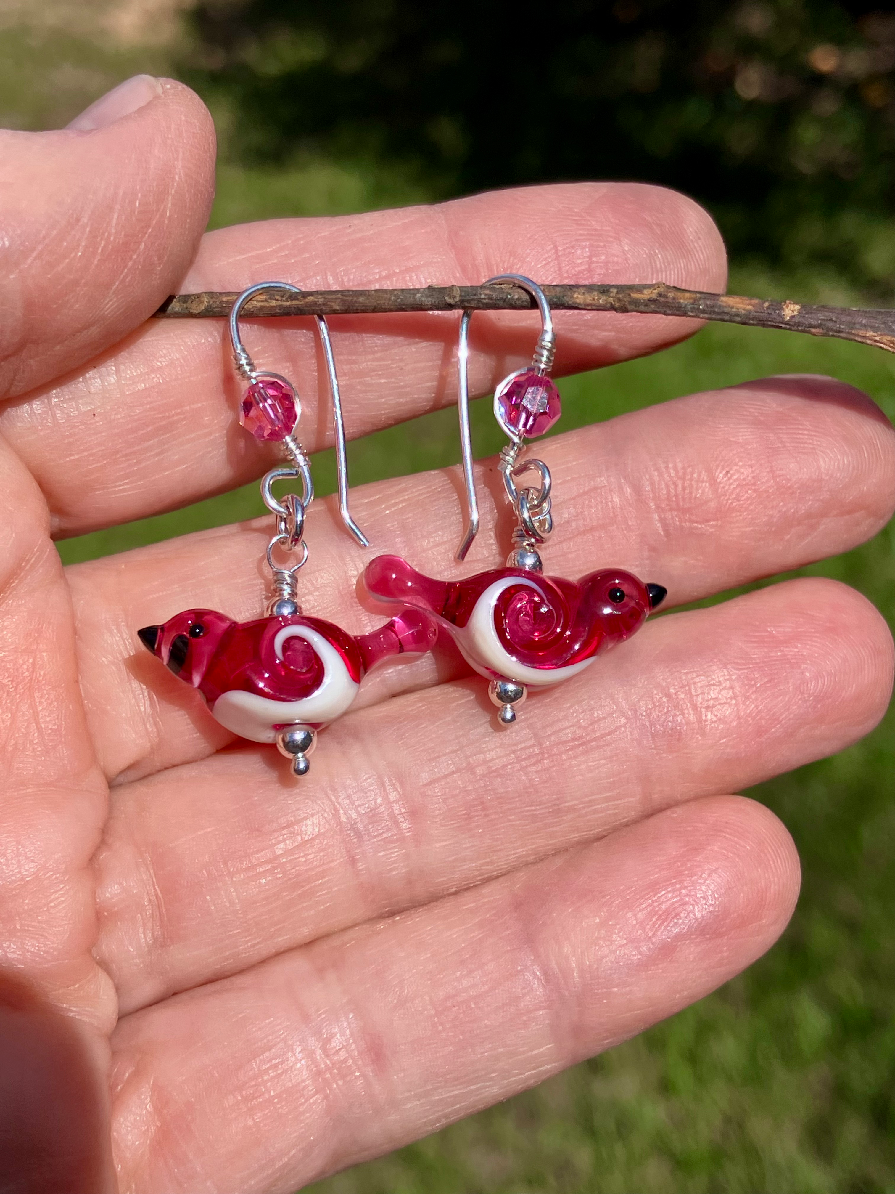 Pink and white swirl bird earrings 