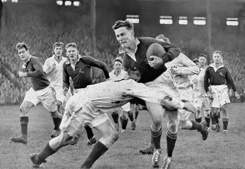 Springbok winger Paul Johnstone being tackled in the Scotland vs South Africa game in 1952.