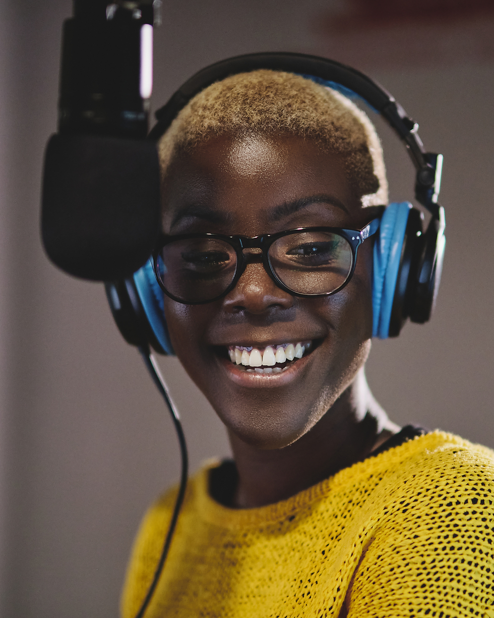 Image representing women listening to a radio advert