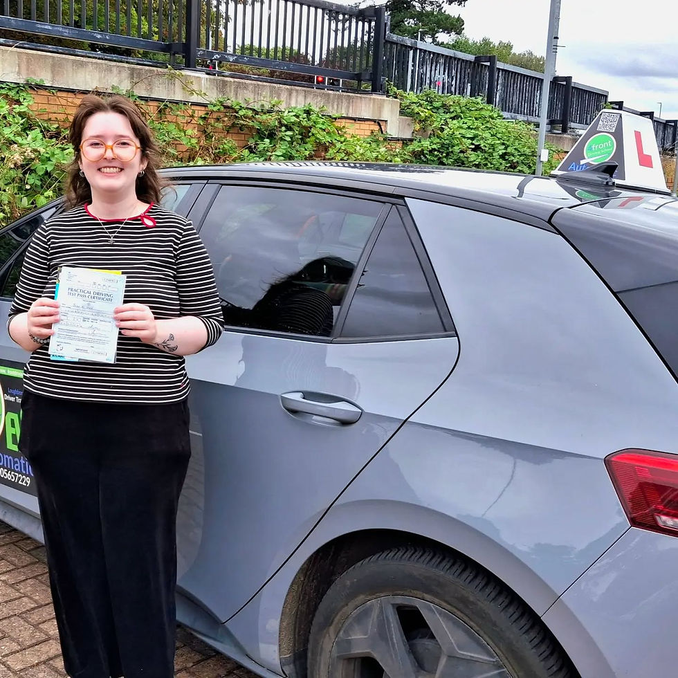 An automatic pass for Jade with her instructor Simon at 4front Driving School