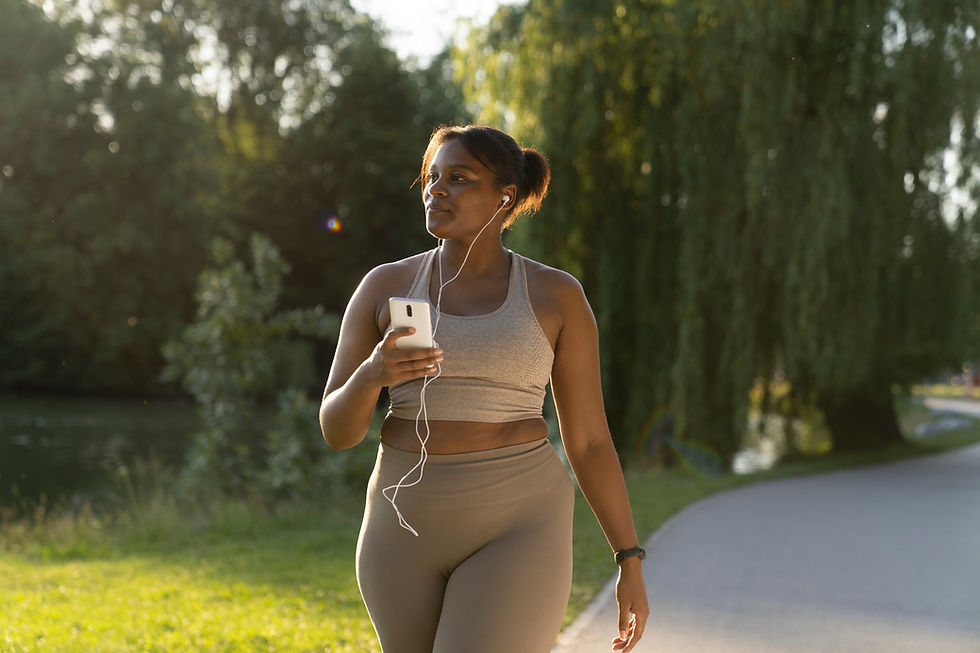 woman walking listening to music