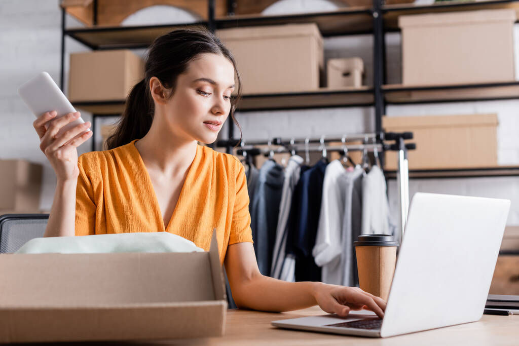 An entrepreneur setting up her online store on Wix.