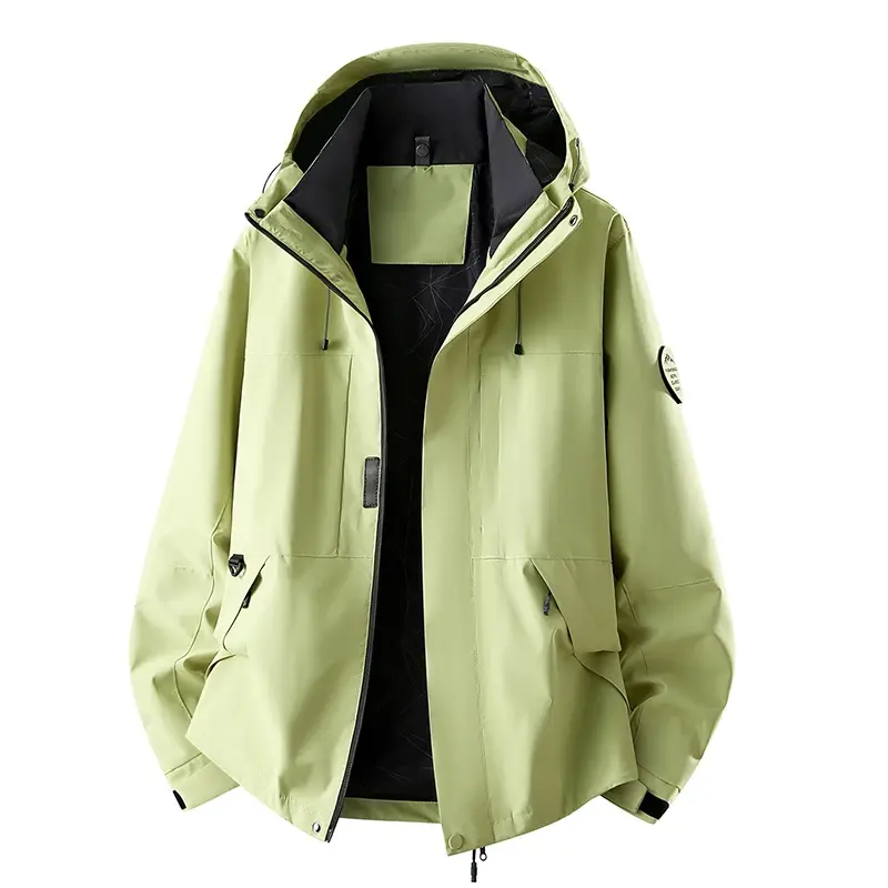 Miniaturebillede: Bright yellow hooded jacket with black interior, zippered pockets, and a round patch on the sleeve.