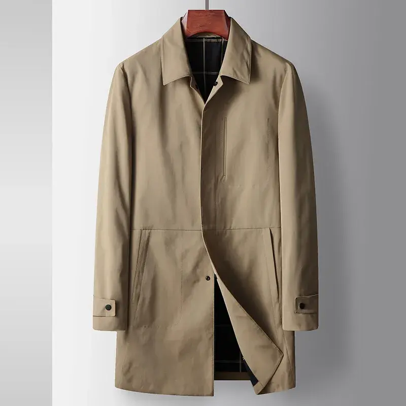 Tan trench coat on a wooden hanger, featuring a collar and front pockets, against a neutral gradient background.