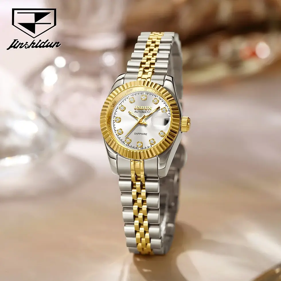 Silver and gold watch with a round face, diamond markers, and a textured bezel, on a two-tone metal bracelet.