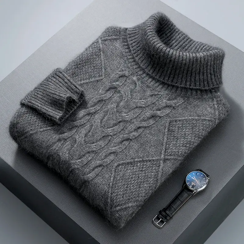 縮圖：Gray cable-knit turtleneck sweater folded, with a blue-faced wristwatch on a gray surface.
