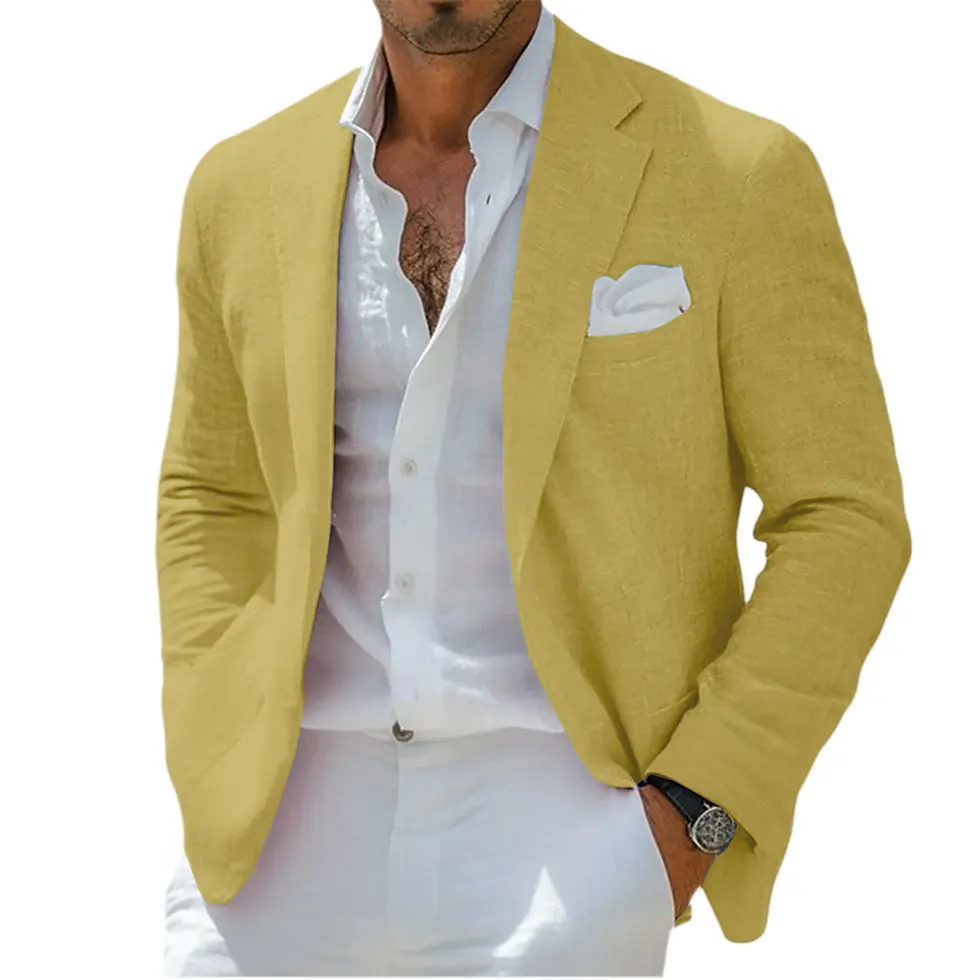 Thumbnail: Man in a tan suit jacket with a white shirt and pants, wearing a watch, standing outdoors with greenery in the background.