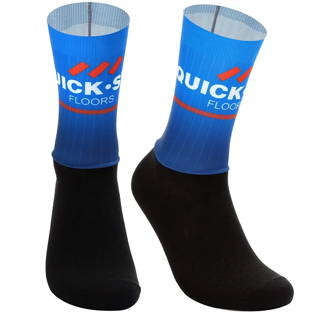 Black and blue socks with red stripes and white text, featuring the words "Quick" and "Floors."