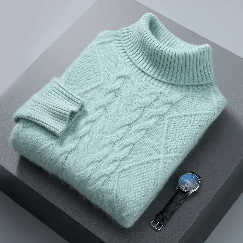 Thumbnail: Mint green cable-knit turtleneck sweater on gray surface, next to a silver watch with a blue face and black strap.
