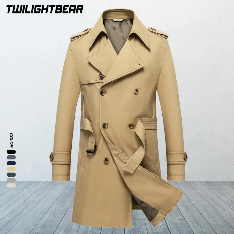 Tan trench coat with double-breasted design, shoulder epaulets, belted waist, and buttoned cuffs on a light background.