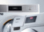 Self-service washing machines and tumble dryers