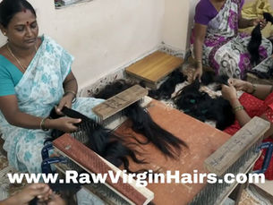 High-quality Raw Cambodian Hair Extensions undergoing manual processing