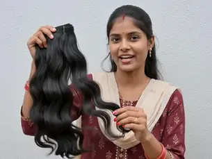 Beautiful Raw Indian Hair Extensions with natural waves, softness, and lasting durability.
