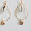 Thumbnail: Cowrie Shell Gold Oval Earrings