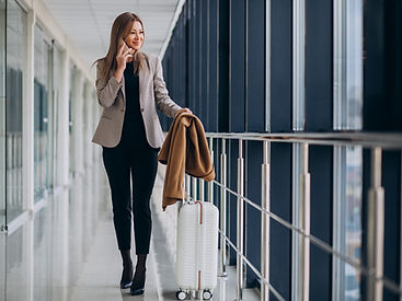 business-woman-terminal-with-travel-bag-