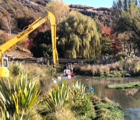 The remote-controlled dredge at work in one of Millbrook’s ponds.