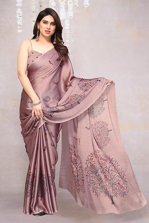 Woman wearing a mauve saree posing; elegant look, Shopizo.