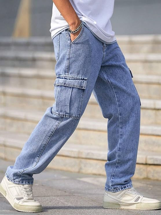 Thumbnail: Man in blue cargo jeans and white shoes walking on steps Shopizo