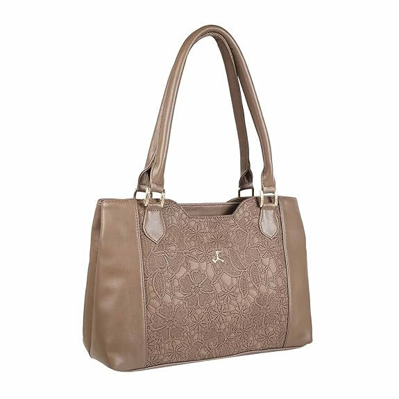 Thumbnail: Elegant brown handbag with decorative front design Shopizo.