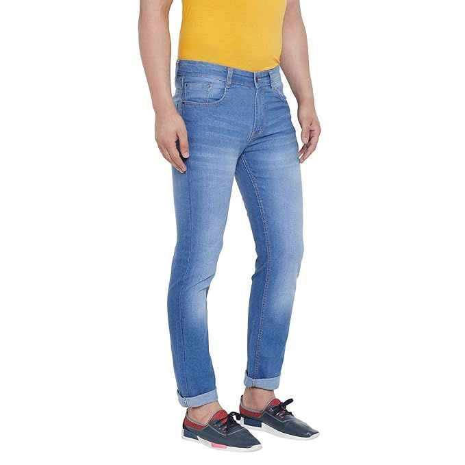 Man wearing blue jeans and a yellow shirt Shopizo style and fashion